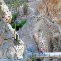 Curtis walking on cement bridge in Cotahuasi canyon