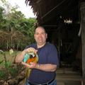 Curtis holding Blue the macaw