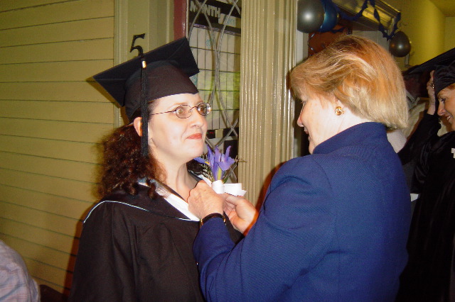 Kay stabbing Leah w/ a corsage pin